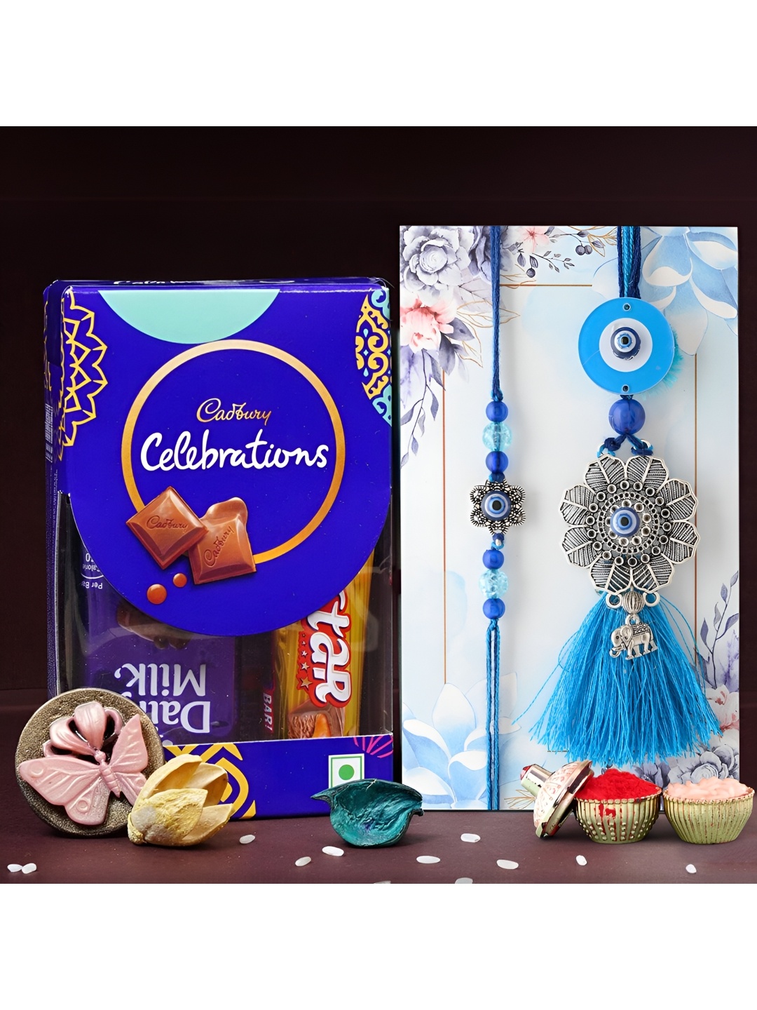 

Ascension Bhaiya Bhabhi Rakhi With Small Celebration Chocolate & Roli Tilak, Blue