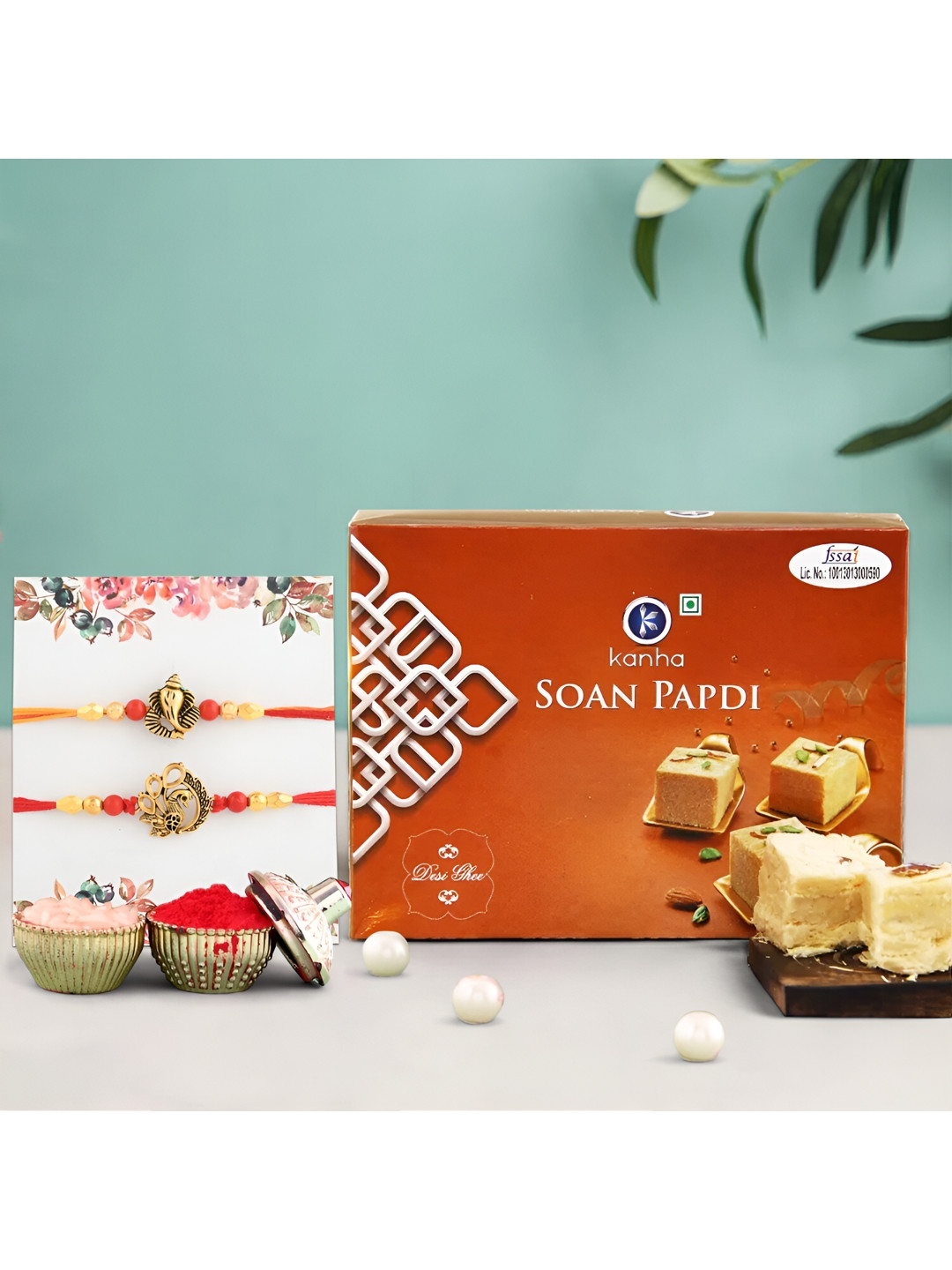 

Ascension Set of 2 Rakhi With Soanpapdi Sweet (200gm) & Greeting Card With Roli Chawal, Red