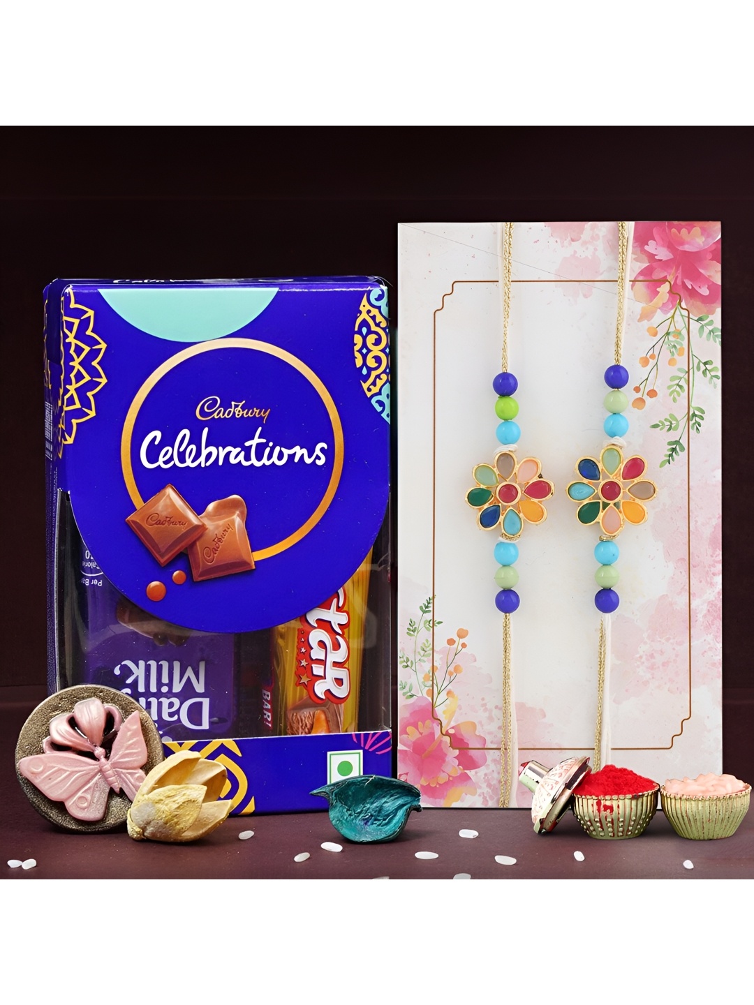 

Ascension Set Of 2 Rakhi With Small Celebration Pack & Rholi Chawal, Blue