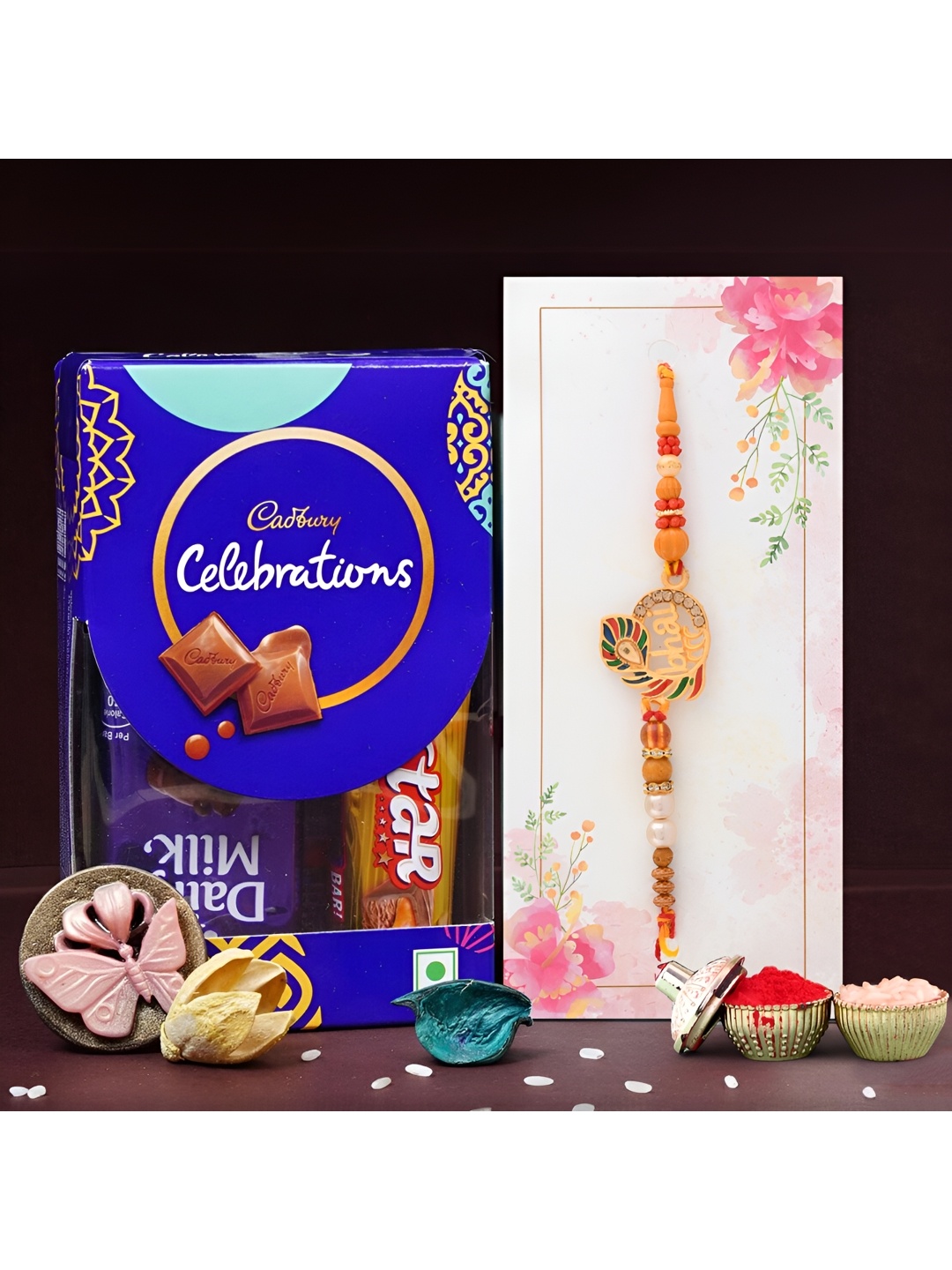 

Ascension Beaded Rakhi With Chocolates & Greeting Card With Roli Chawal, Orange