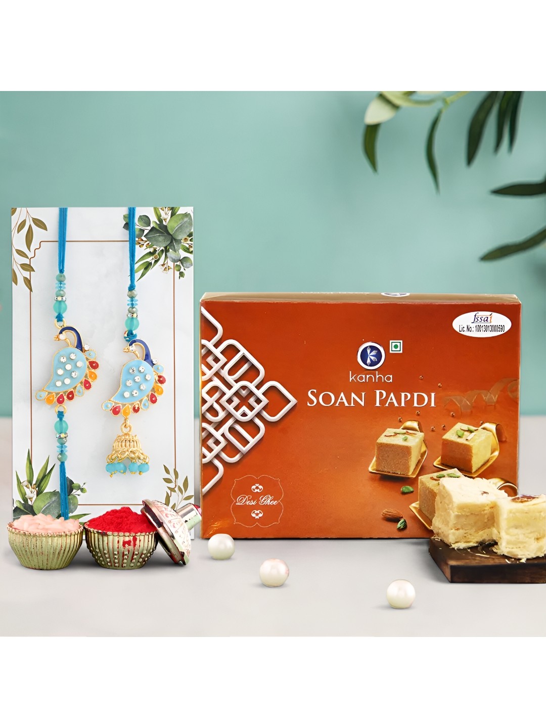 

Ascension Bhaiya Bhabhi Rakhi With Soanpapdi Sweet & Roli Tilak, Blue
