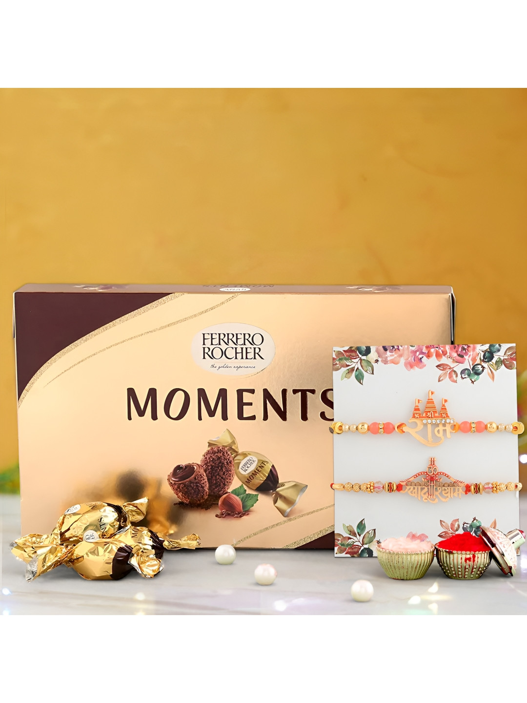 

Ascension Set of 2 Rakhi With Ferrero Rocher Chocolates & Greeting Card With Roli Chawal, Orange