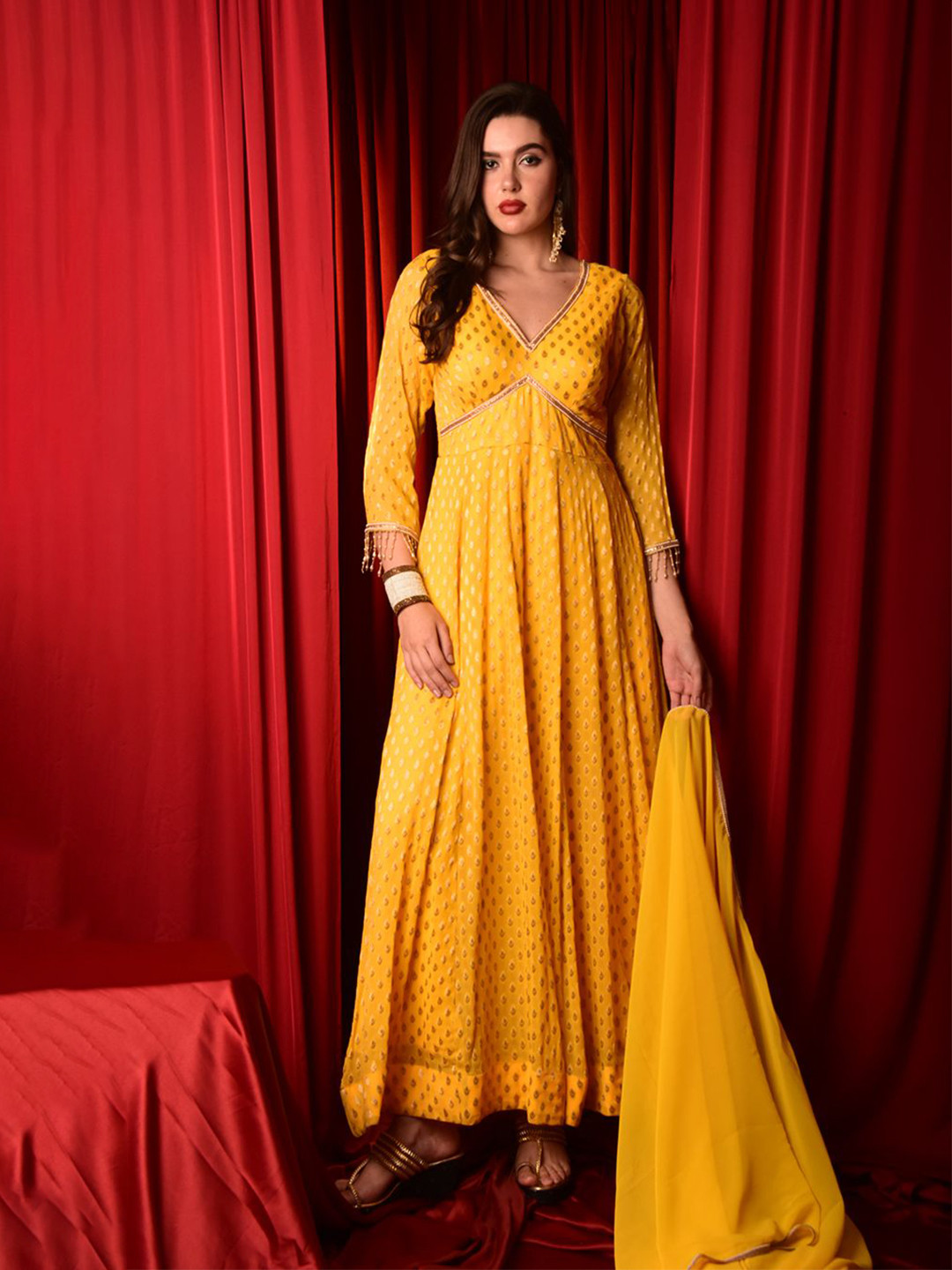 

Laalzari Women Georgette Maxi Ethnic Dresses, Yellow