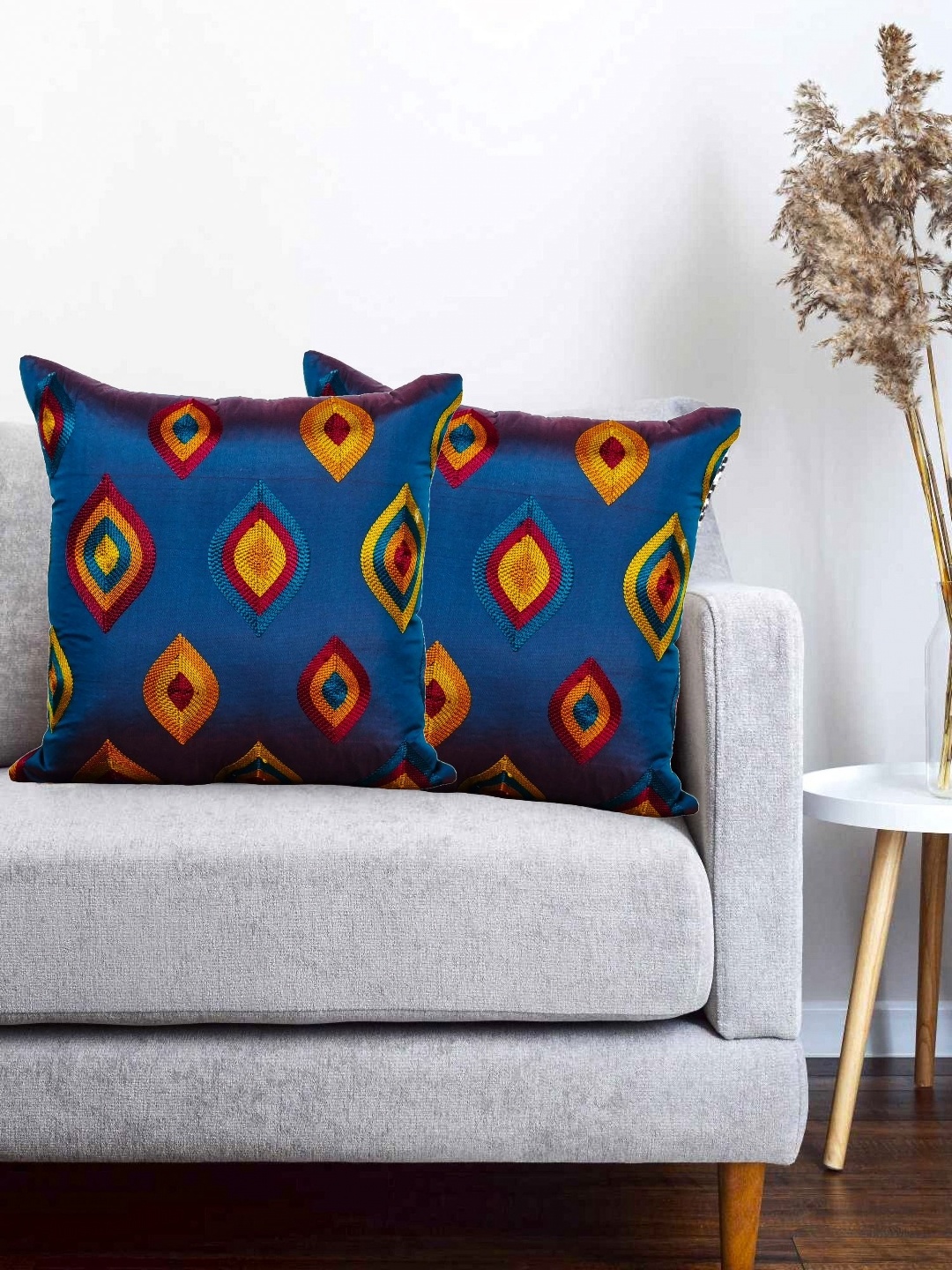 

Vinayaka Fab Blue & Orange 2 Pieces Geometric Embroidered Square Cushion Covers