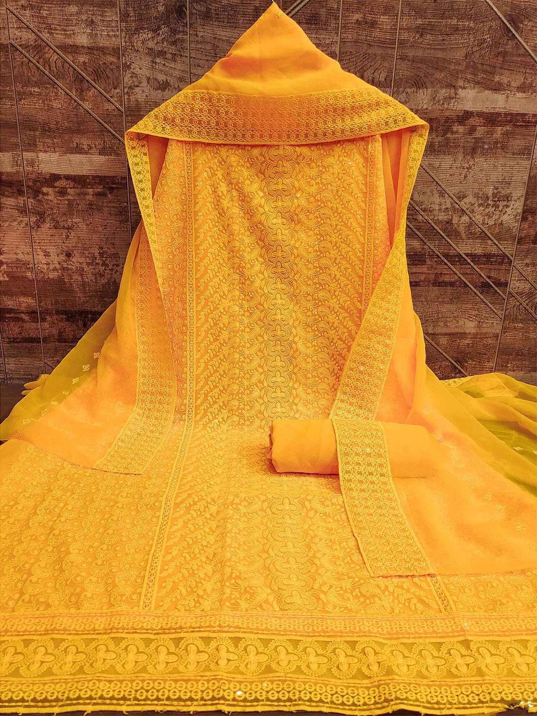

Peachmode Embroidered Silk Georgette Unstitched Dress Material, Yellow