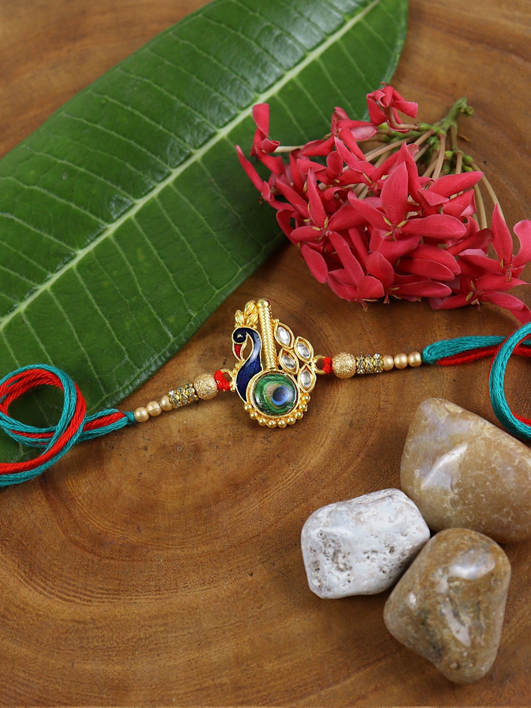 

Asthetika Peacock Kundan Stone Studded Rakhi with Roli Chawal, Blue