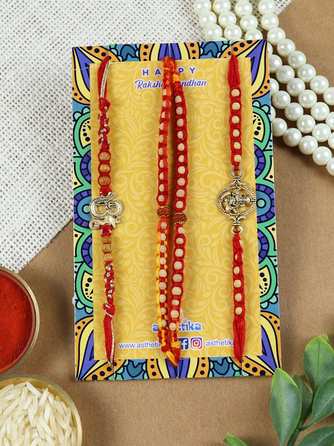 

Asthetika Set of 4 Om Ganesha Rakhis with Roli Chawal, Red