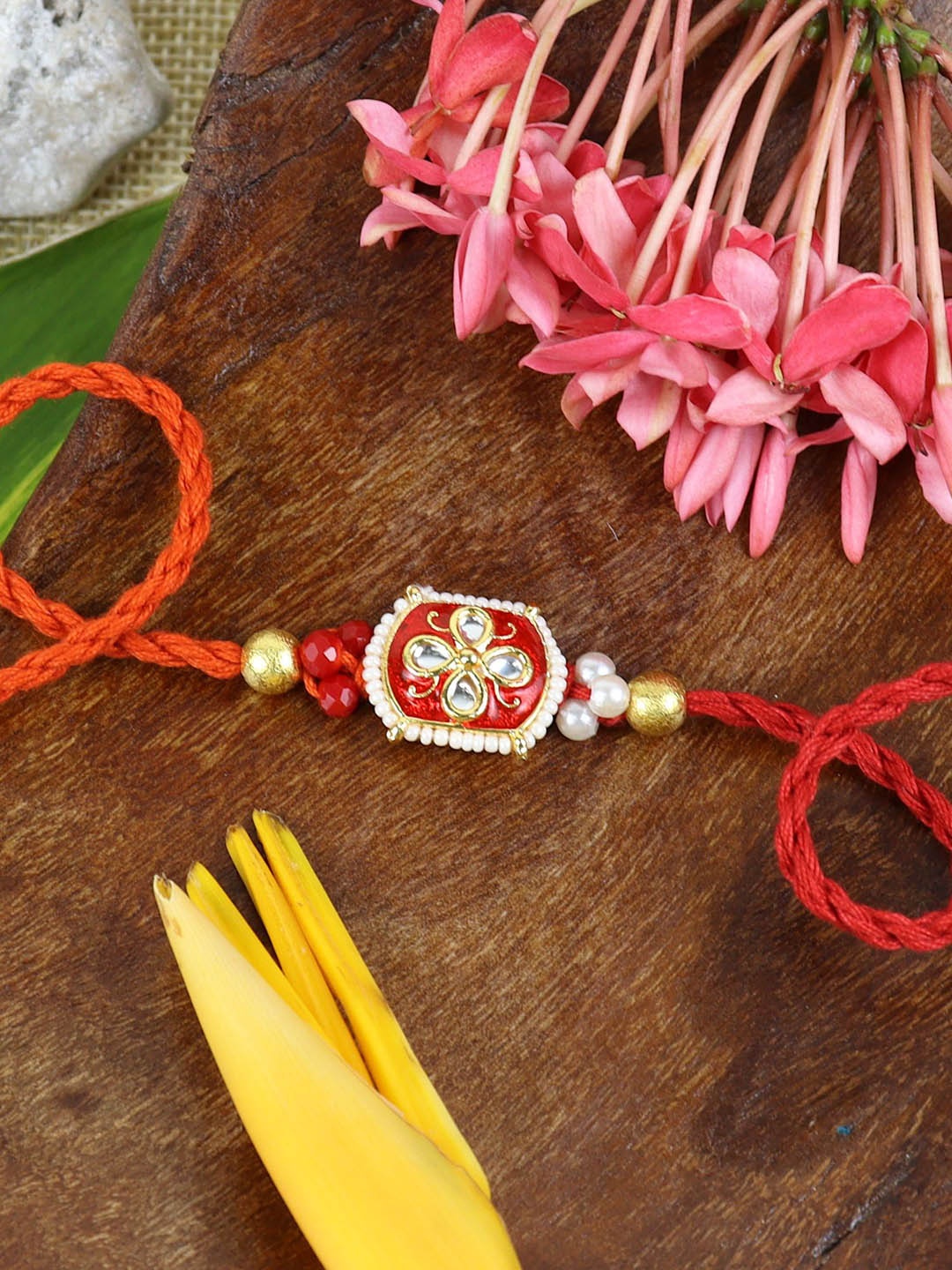 

Asthetika Kundan Stone Studded Rakhi with Roli Chawal, Red