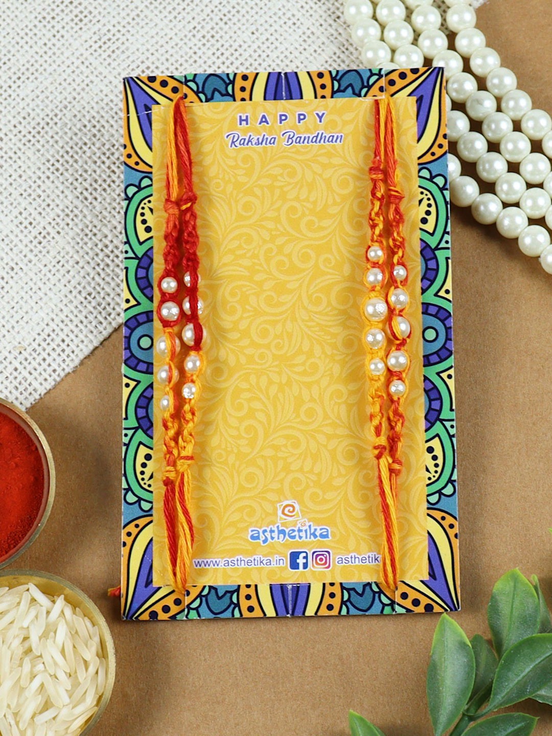 

Asthetika Set of 4 Traditional Beaded Rakhis with Roli Chawal, Orange