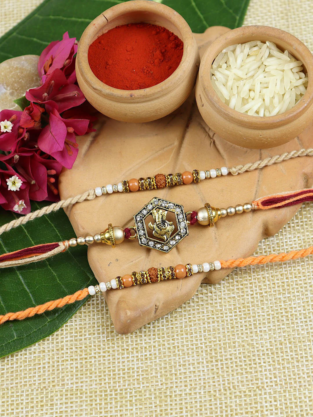 

Asthetika Set of 3 Ganesha Rakhis with Roli Chawal, Red