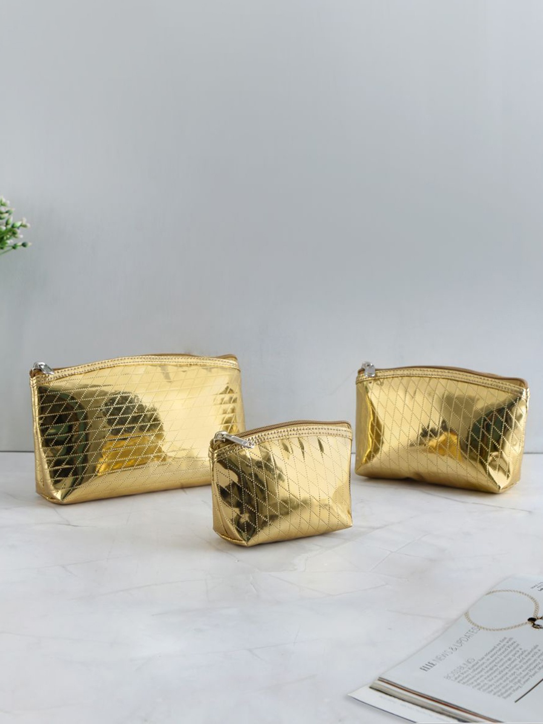 

THE HOME CO. Unisex Set of 3 Textured Pouch Travel Accessory, Gold