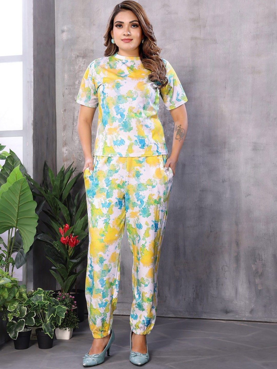 

Titanium Silk Industries Printed Round Neck Tshirt with Trouser Co-Ords, Yellow