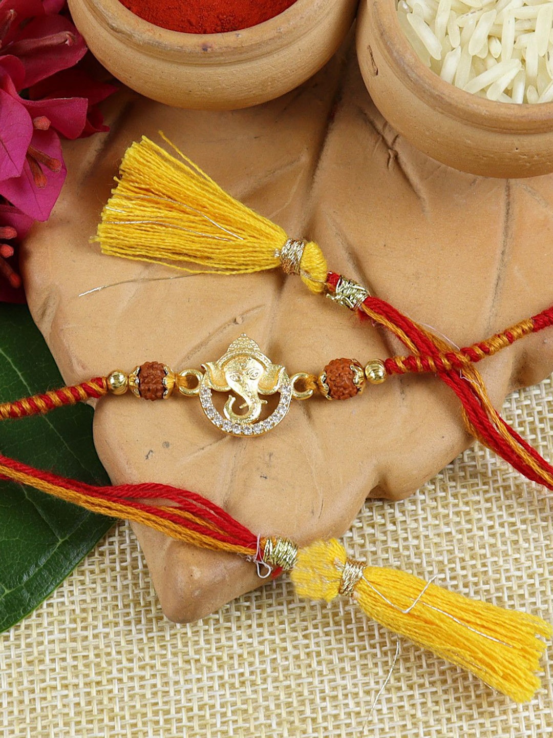 

Asthetika Ganesha Design Beaded Rakhi with Roli Chawal & Greeting Card, Orange