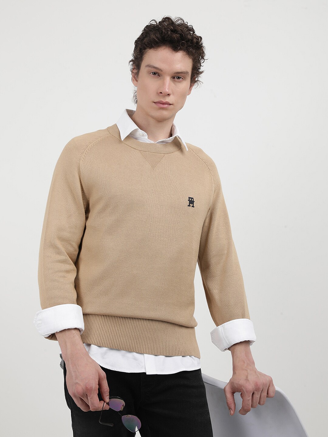 

Tommy Hilfiger Men Solid Round Neck Pullover Sweater, Beige