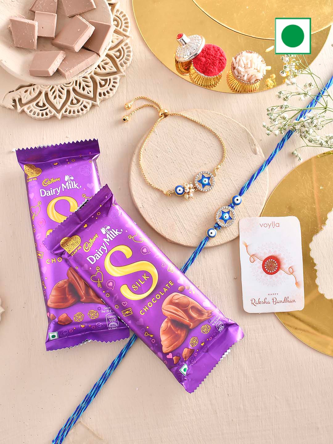 

Voylla Set Of 2 Bhaiya Bhabhi Rakhis With 2 Chocolates, Multi
