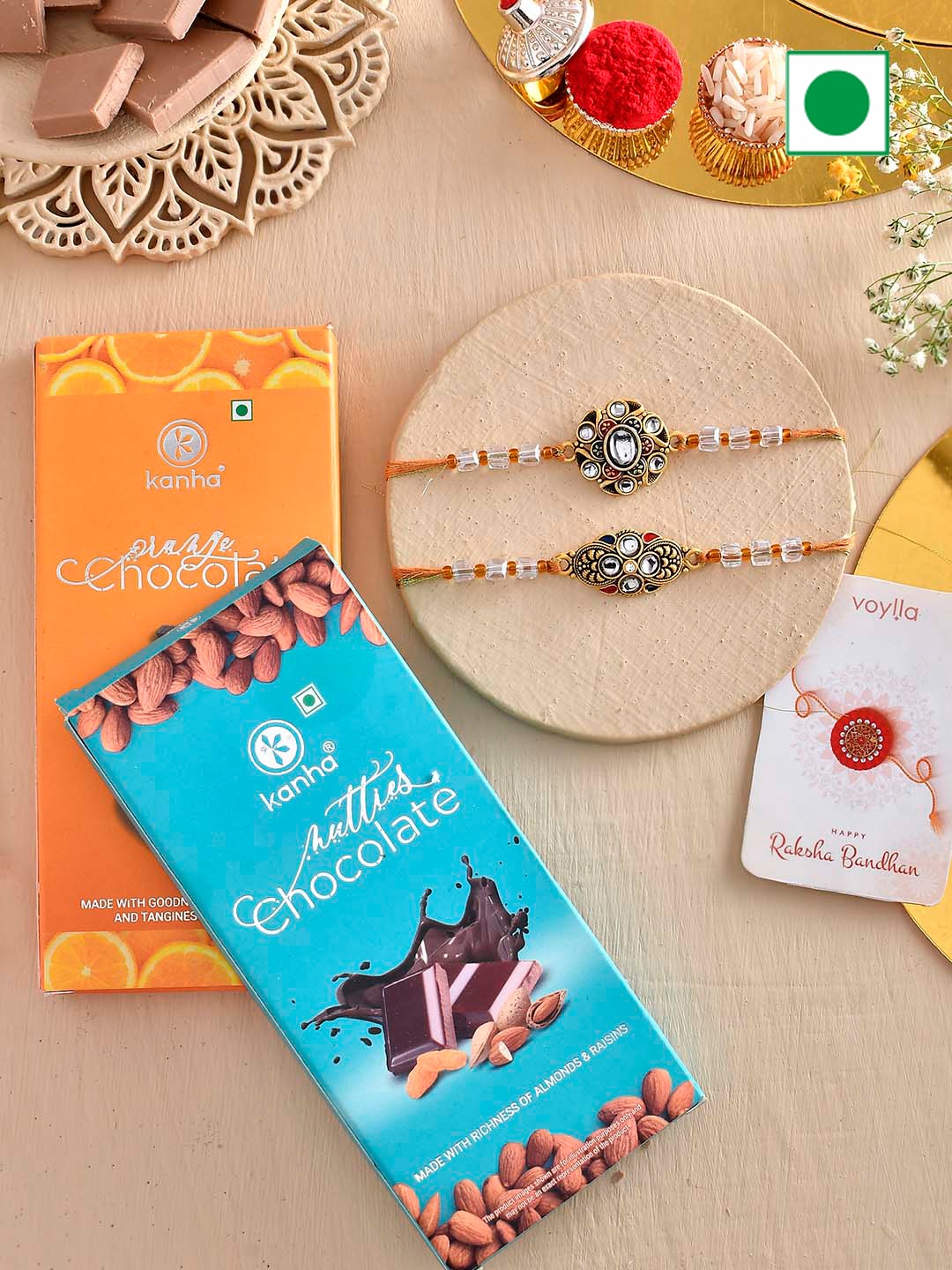 

Voylla Set Of 2 Rakhis With Orange And Nutty Chocolate Bar, Red