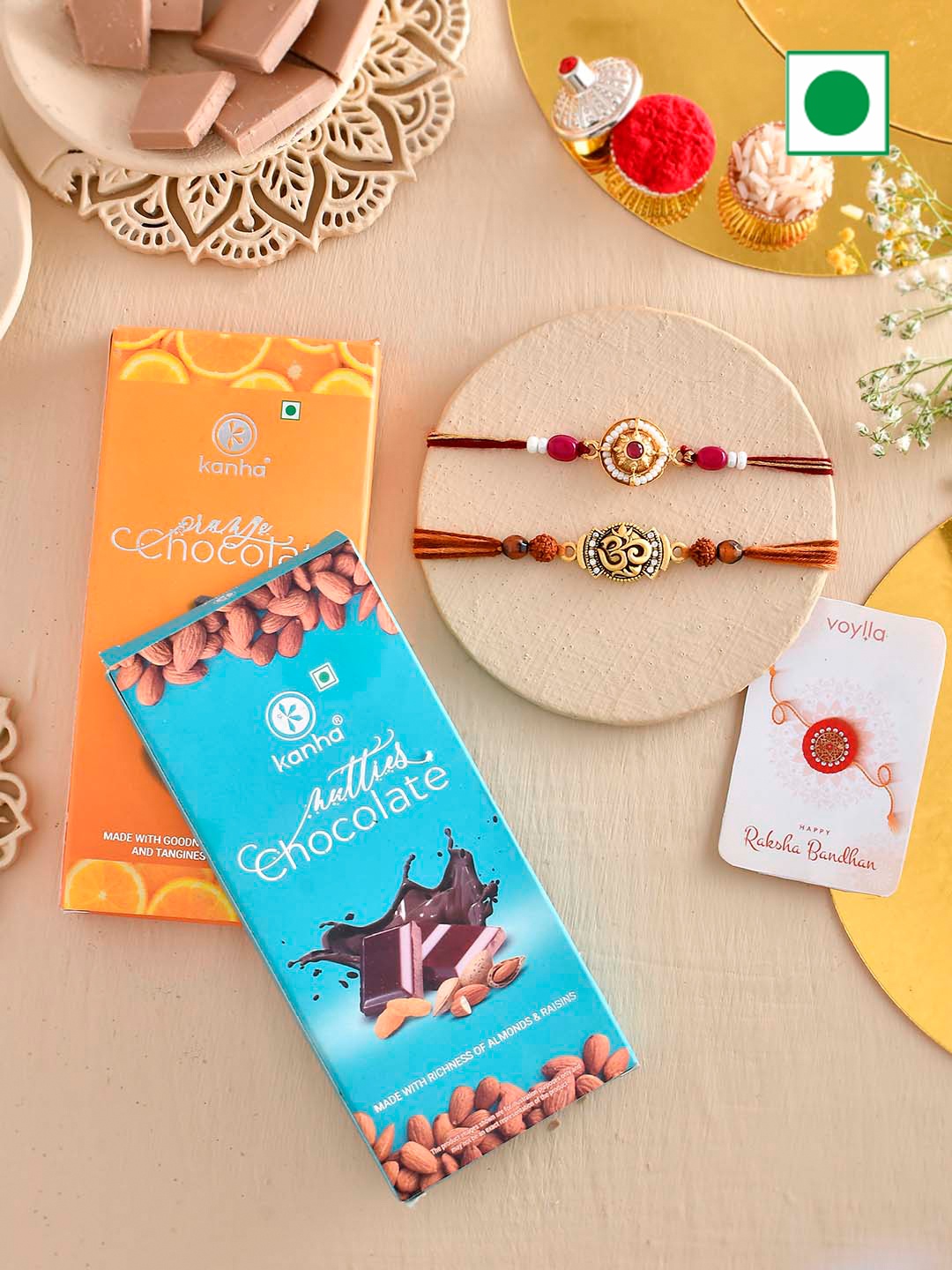 

Voylla Set Of 2 Rakhi With Orange And Nutty Chocolate Bar, Red