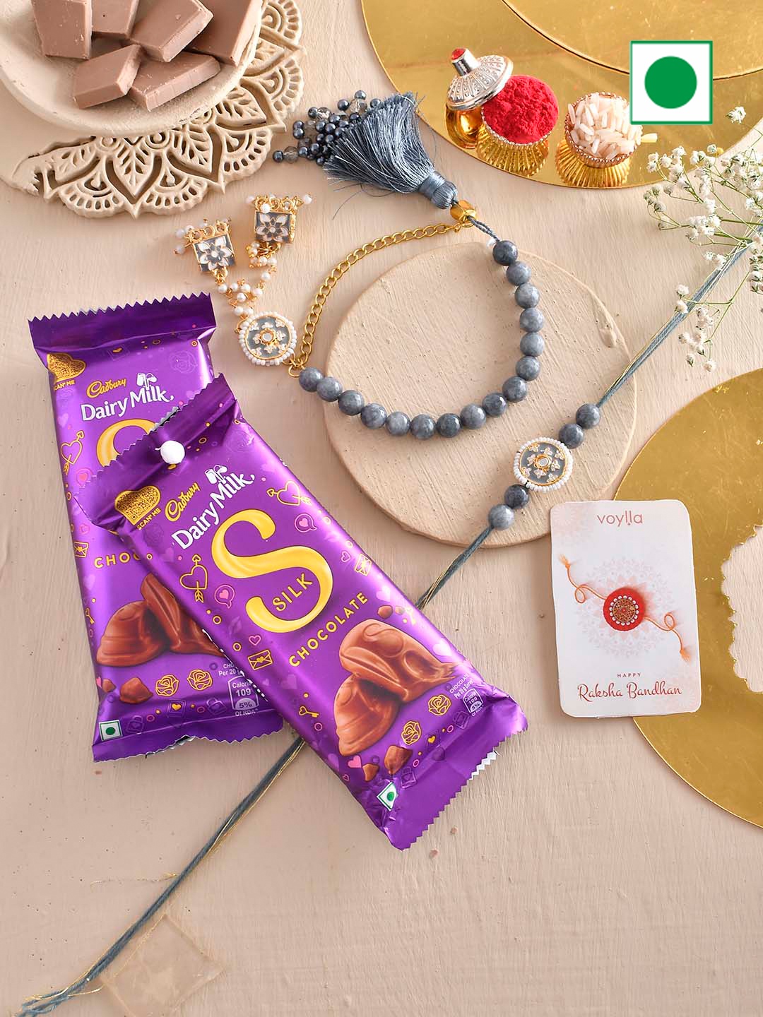 

Voylla Set Of 2 Bhaiya Bhabhi Rakhis With 2 Chocolates, Multi