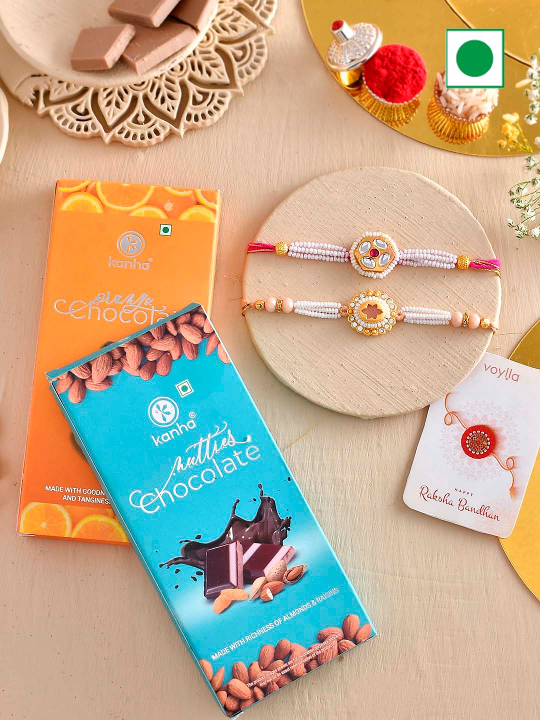 

Voylla Set Of 2 Rakhis With Orange And Nutty Chocolate Bar, White