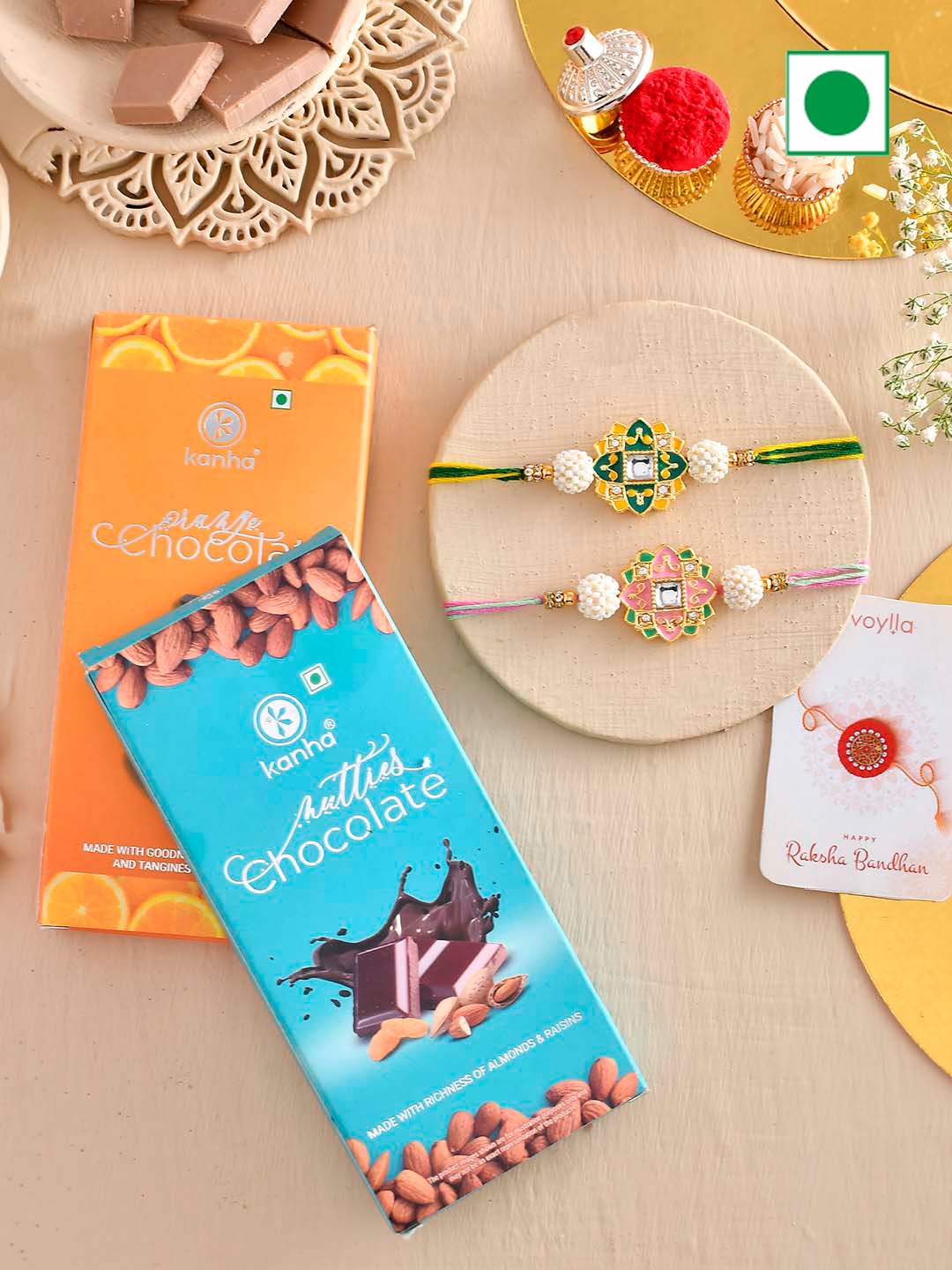 

Voylla Set Of 2 Rakhi With Orange And Nutty Chocolate Bar, Green