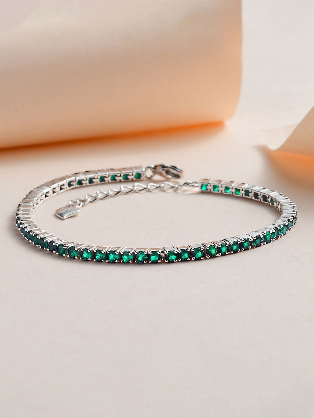 

Ornate Jewels Rhodium-Plated 925 Silver Single Line Emerald Tennis Bracelet