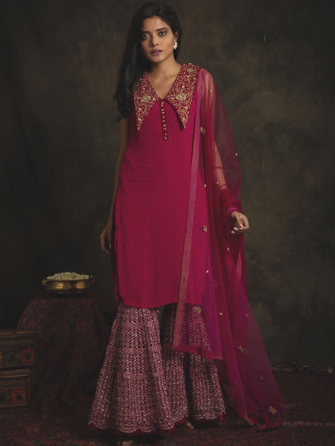 

Nikita Vishakha Floral Embroidered Sequinned Silk Crepe Kurta With Sharara & Dupatta, Magenta