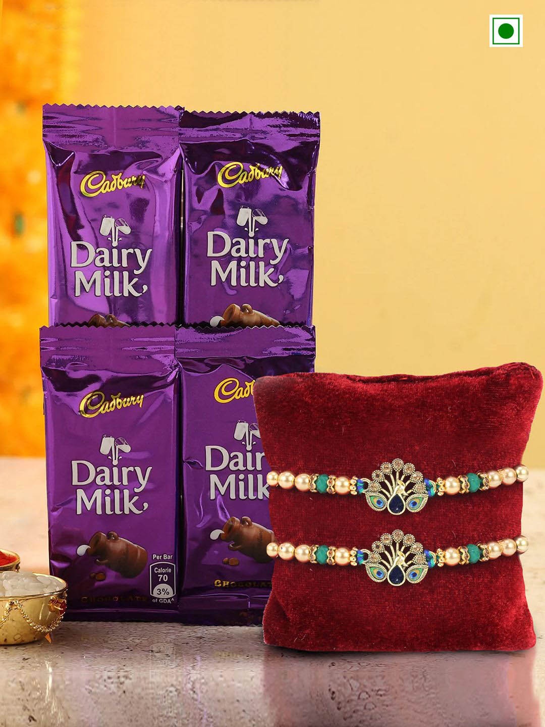 

TIED RIBBONS Set of 2 Peacock Rakhis With 4 Chocolates Gift Set, Red