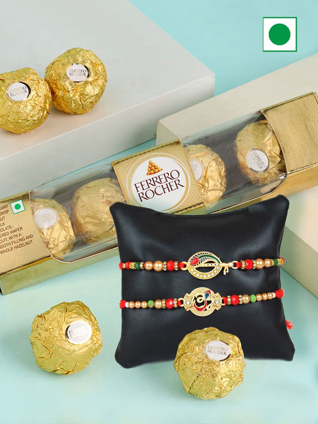 

TIED RIBBONS Set of 2 Ganesha & Om Charm Rakhis With Choclate & Rholi Chawl, Gold