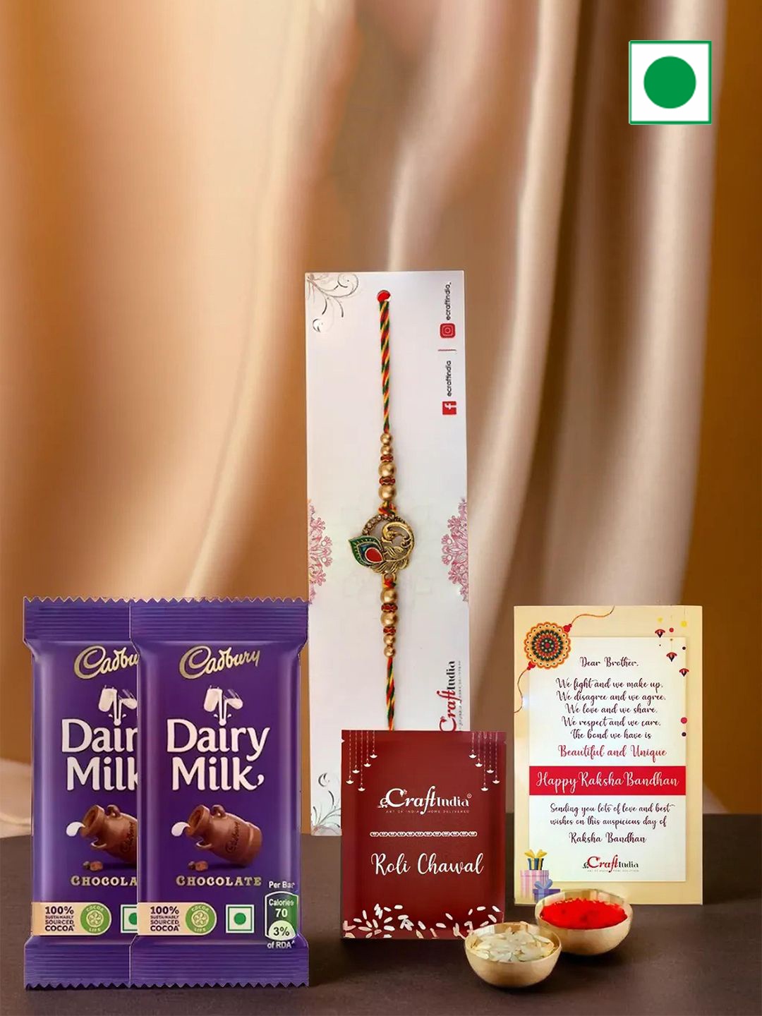 

eCraftIndia Lord Ganesha Rakhi With 2 Cadbury & Greeting Card with Roli Chawal, Red