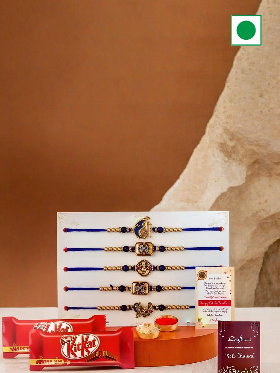 

eCraftIndia Set of 5 Shri Ganesha Peacock Flute Floral Rakhi With Kit Kat, Navy blue