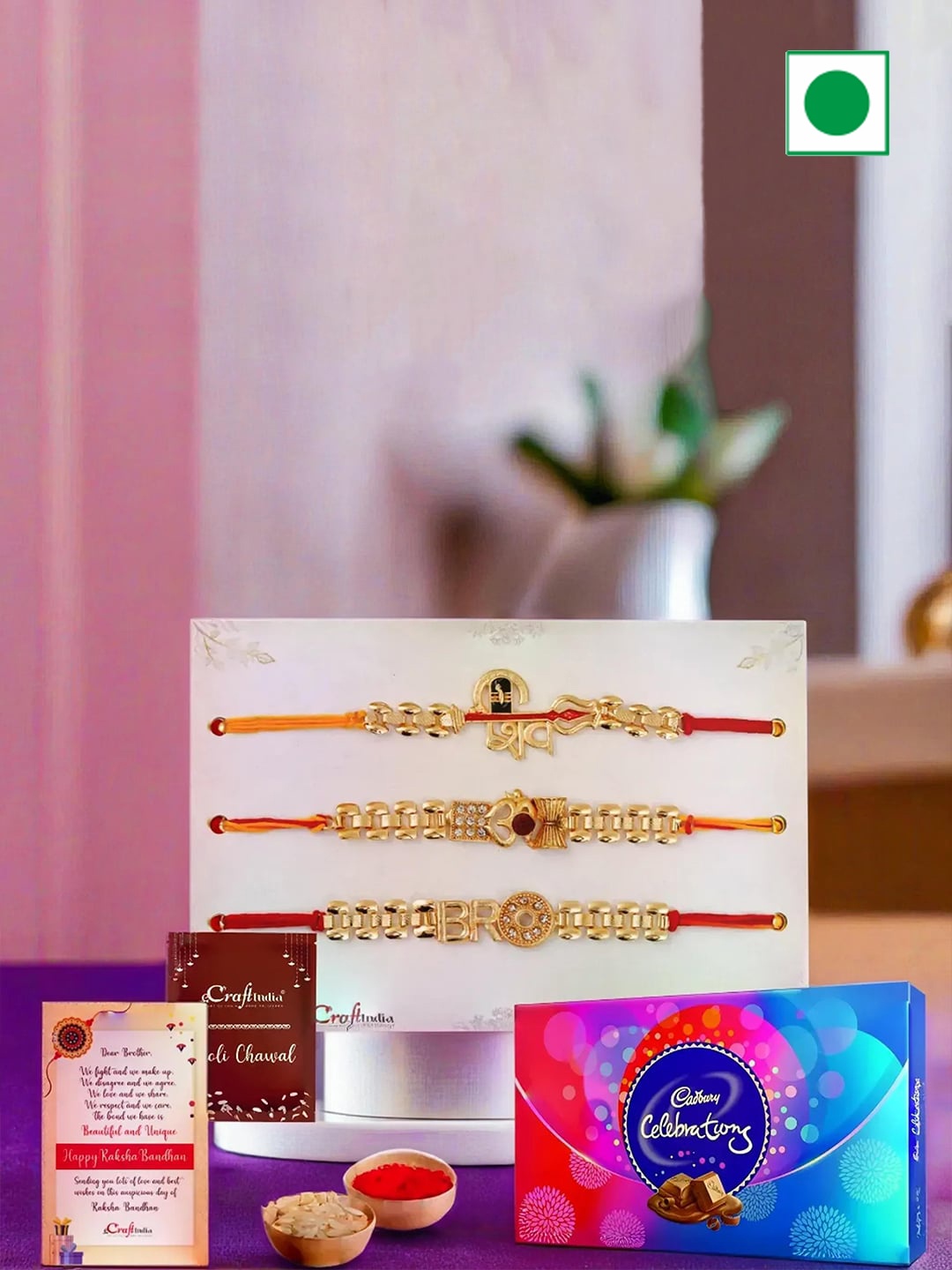 

eCraftIndia Shiva Bro Om Rakhis With Cadbury Celebration Chocolate & Card With Roli Chawal, Red