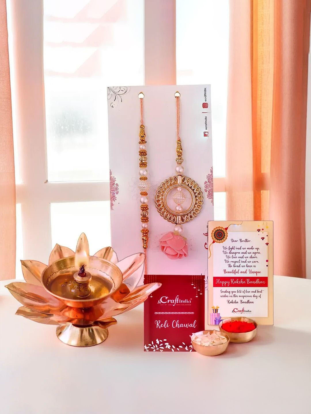 

eCraftIndia Set Of 3 Floral Designer Bhaiya Bhabhi Rakhis With Lotus Flower Diya, Pink