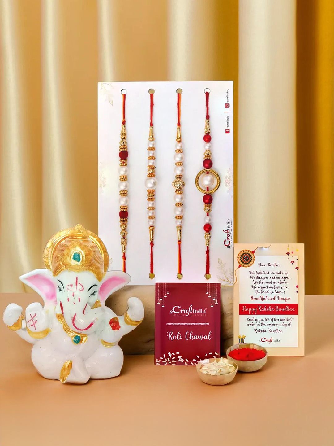 

eCraftIndia Set of 5 Rakhis with Lord Ganesha Idol & Greeting Card With Roli Chawal, Red