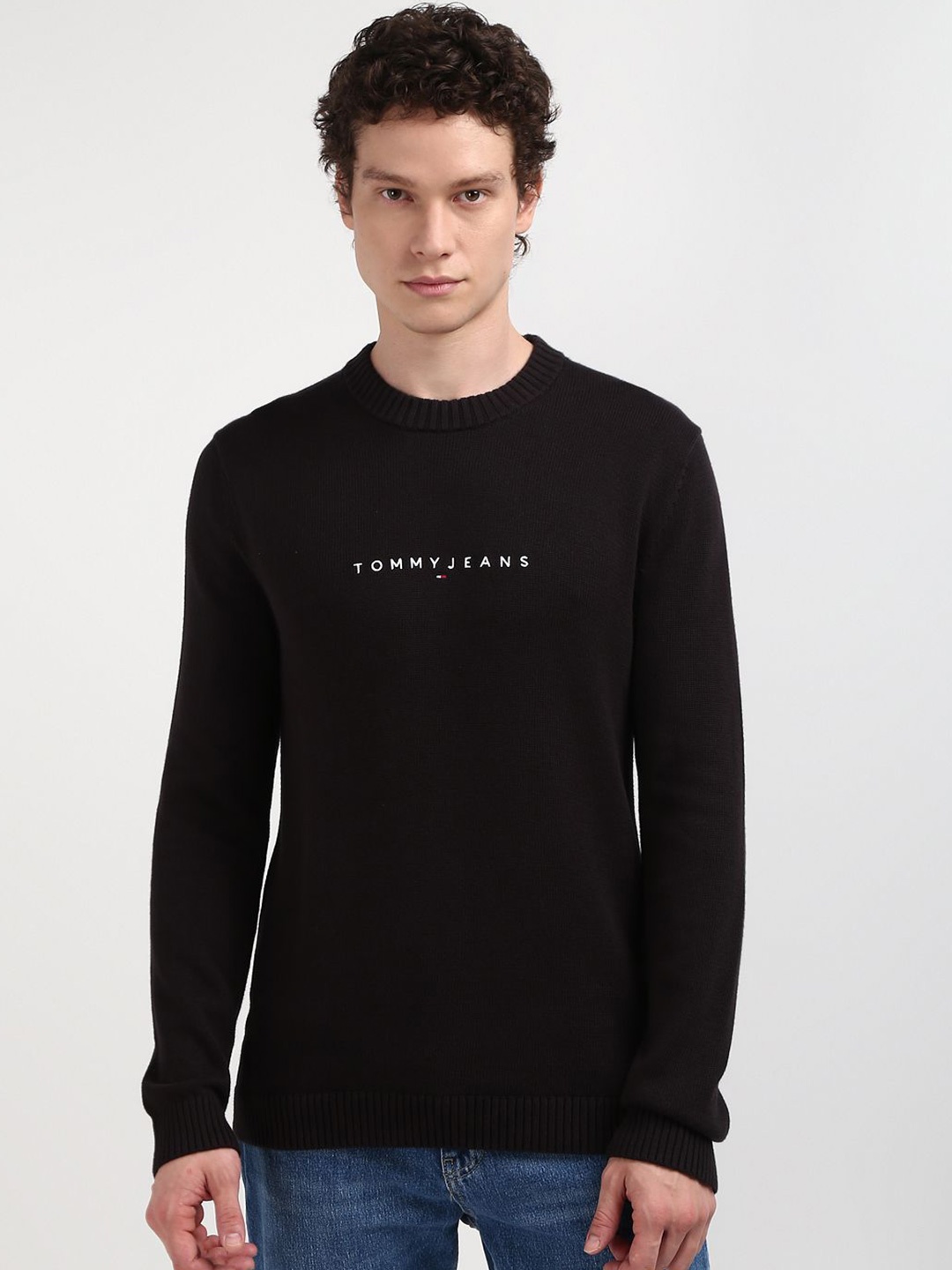 

Tommy Hilfiger Men Solid Round Neck Pullover Sweater, Black