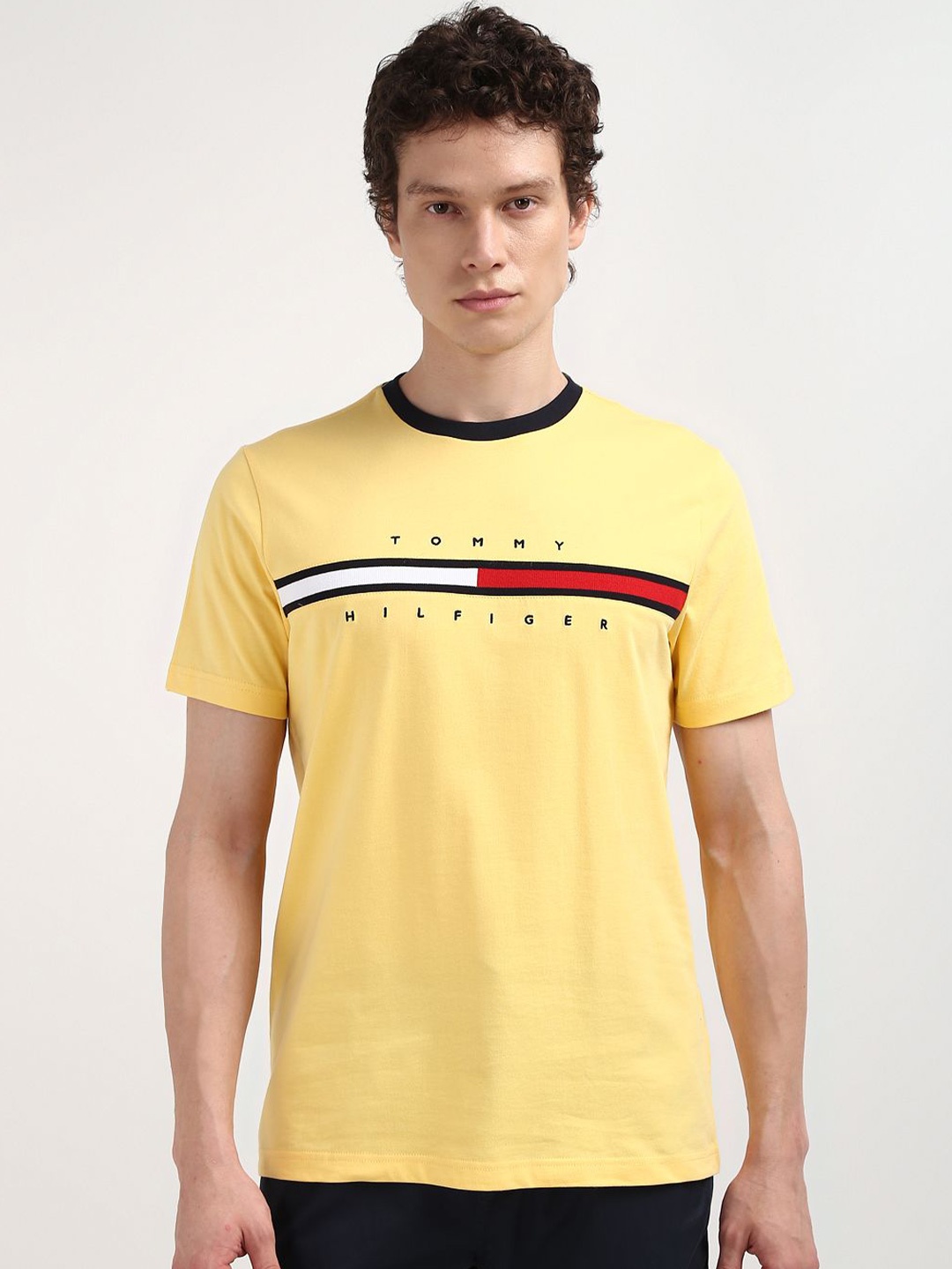 

Tommy Hilfiger Men Typography Printed Round Neck T-shirt, Yellow