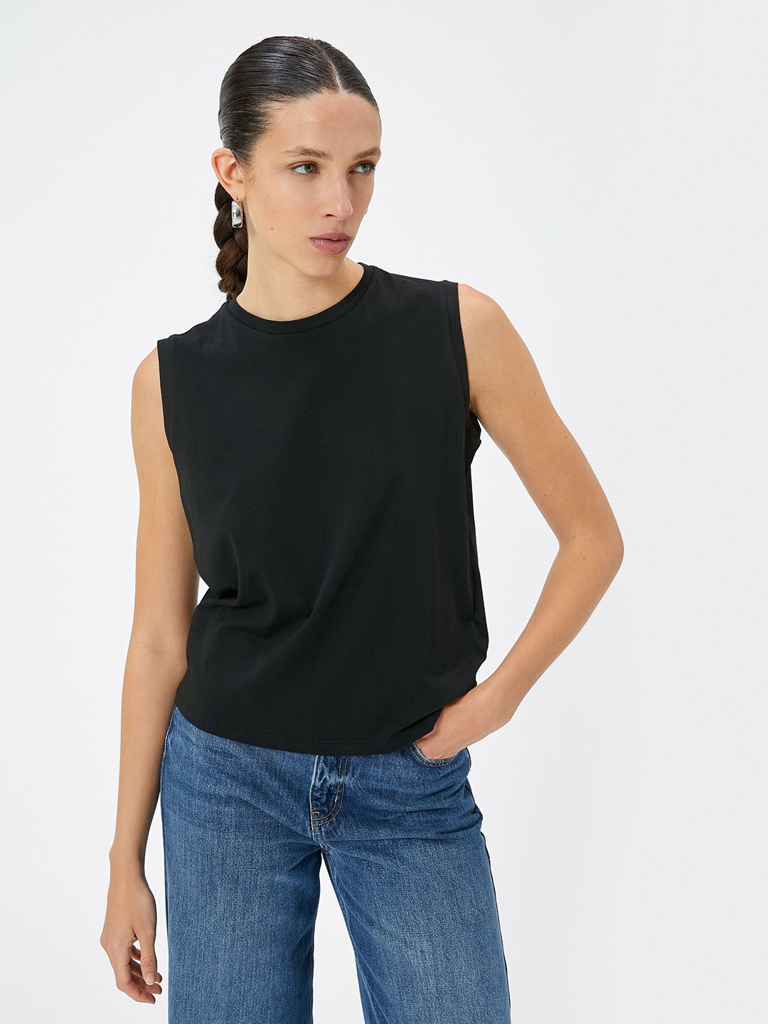 

Koton Women Solid Round Neck T-shirt, Black