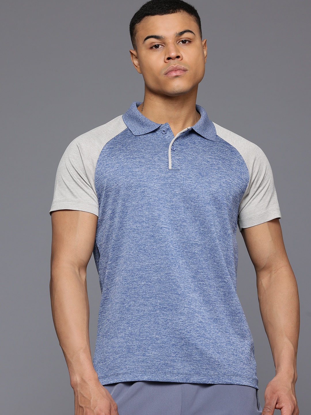 

HRX by Hrithik Roshan Men Colourblocked Polo Collar Sports T-shirt, Blue