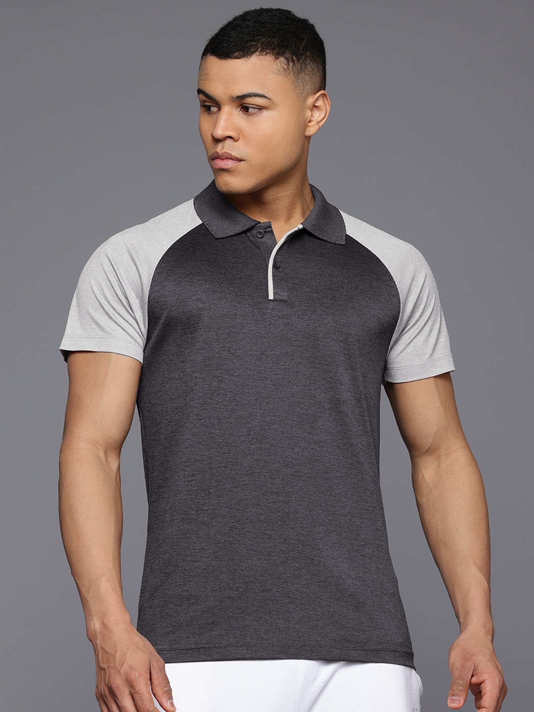 

HRX by Hrithik Roshan Men Colourblocked Polo Collar Sports T-shirt, Black