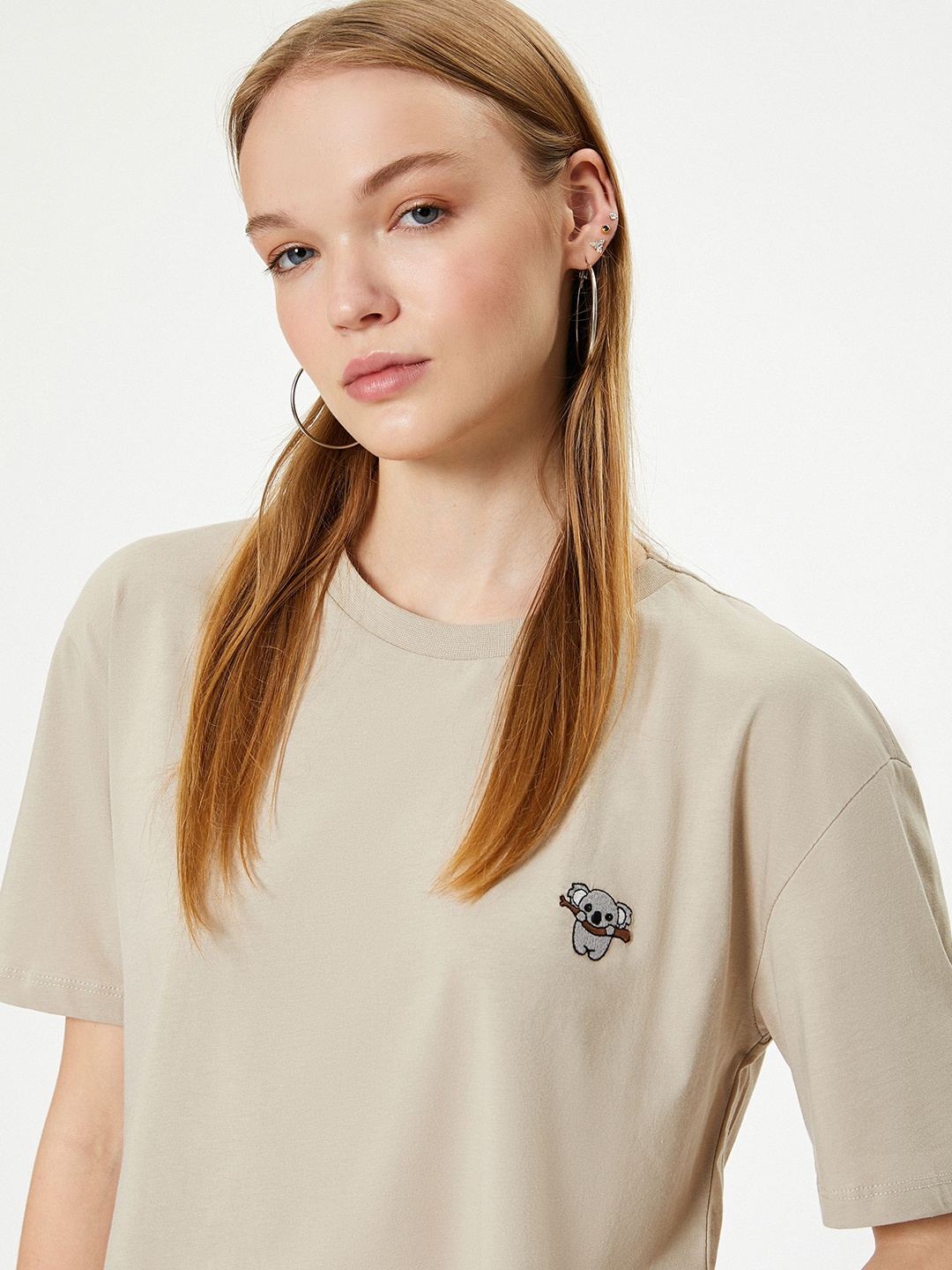 

Koton Women Round Neck Solid Applique Pure Cotton T-shirt, Beige