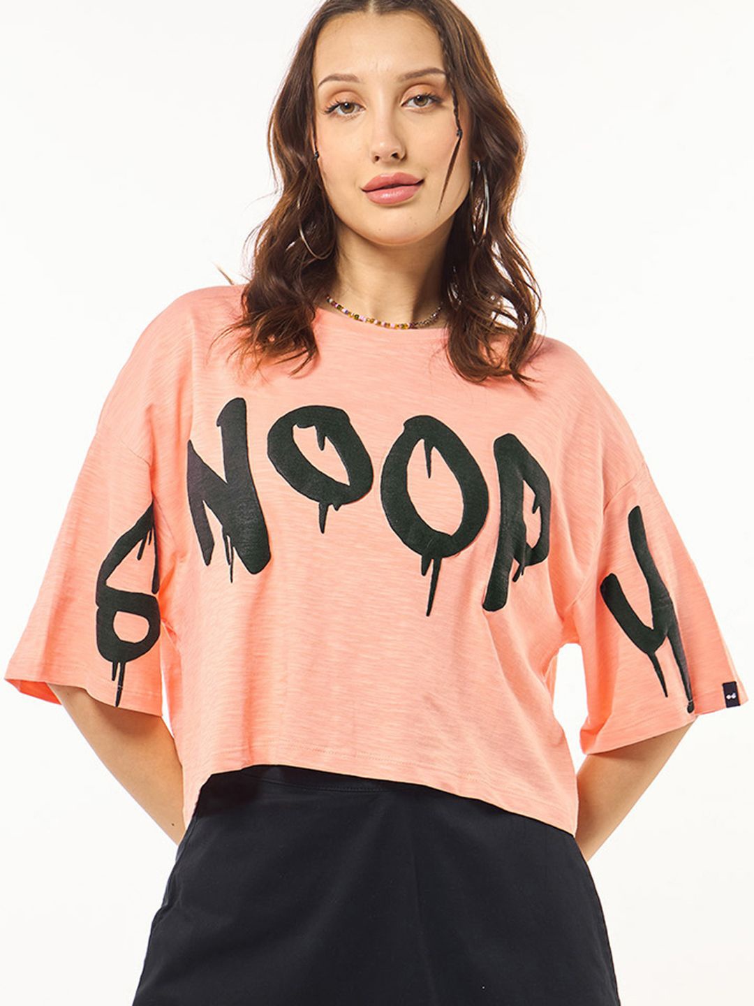 

Bewakoof Air 1.0 Women Vermillion Thrill Seeker Graphic Printed Oversized Short Top, Orange