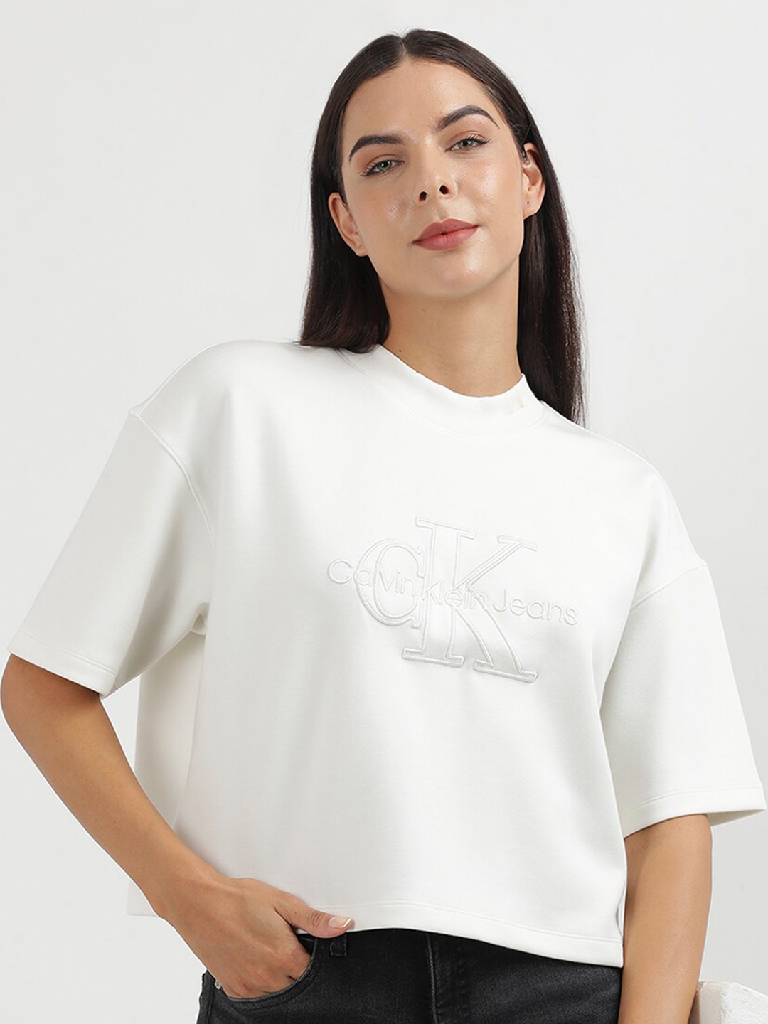 

Calvin Klein Women Typography High Neck Drop-Shoulder Sleeves T-shirt, White