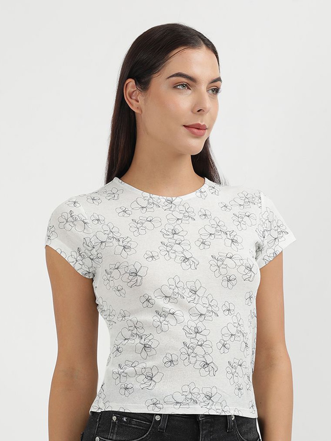 

Calvin Klein Women Floral Printed Polo Collar Pockets Slim Fit T-shirt, Beige