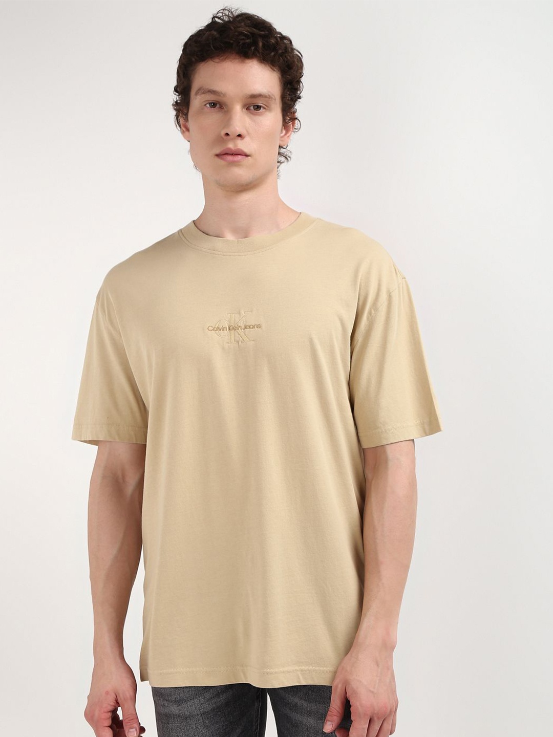 

Calvin Klein Jeans Men Typography Raw Edge T-shirt, Beige