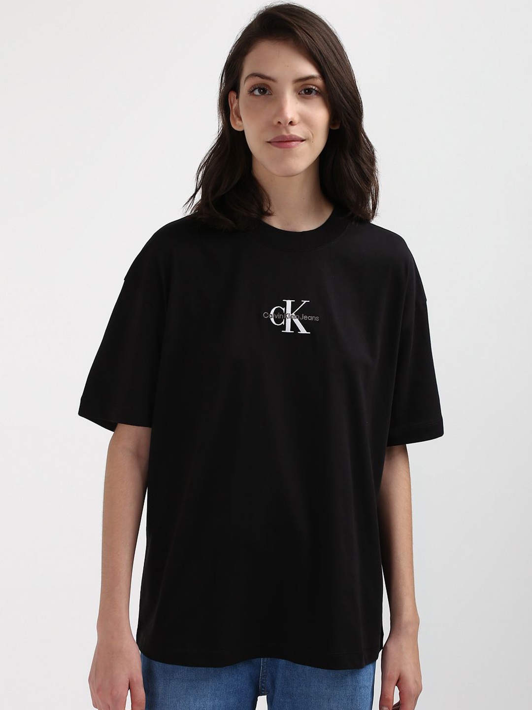 

Calvin Klein Jeans Women Typography Extended Sleeves Pockets T-shirt, Black