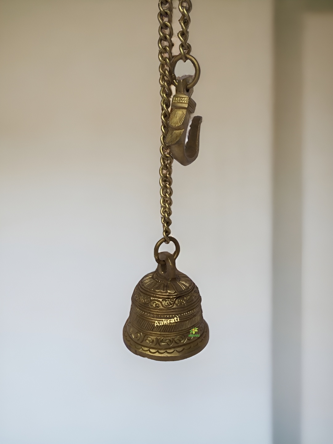 

Aakrati Brown Brass Bell With Chain And Hook