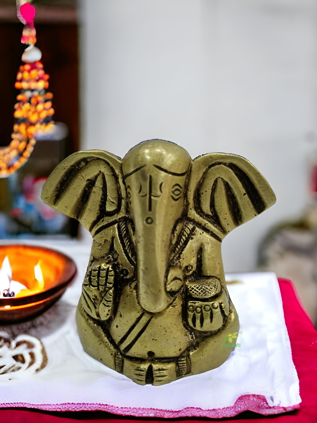 

Aakrati Yellow & Black Brass Religious Ganesh Idol Showpiece