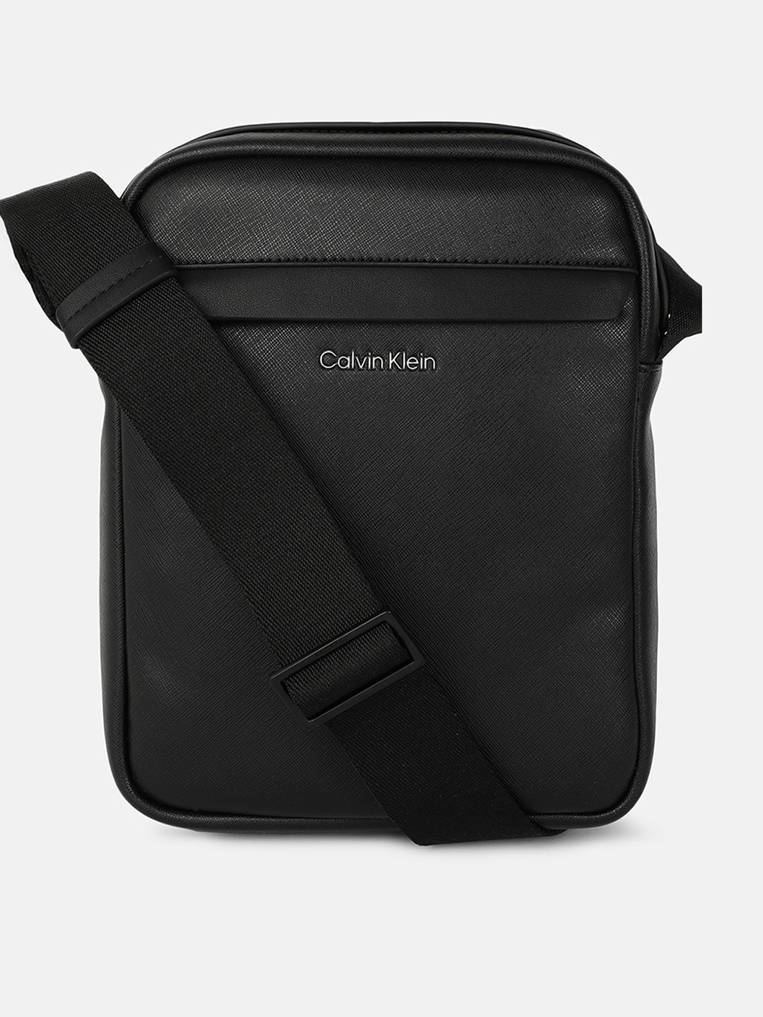 

Calvin Klein Structured Sling Bag with Tasselled, Black