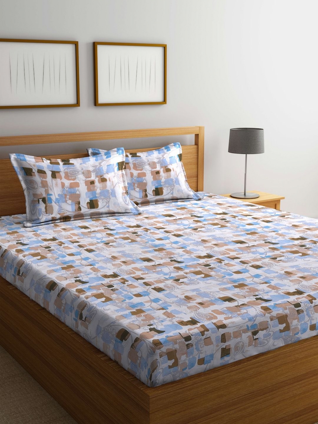 

BOMBAY DYEING Blue & White Printed 144 TC Cotton Queen Bedsheet with 2 Pillow Covers