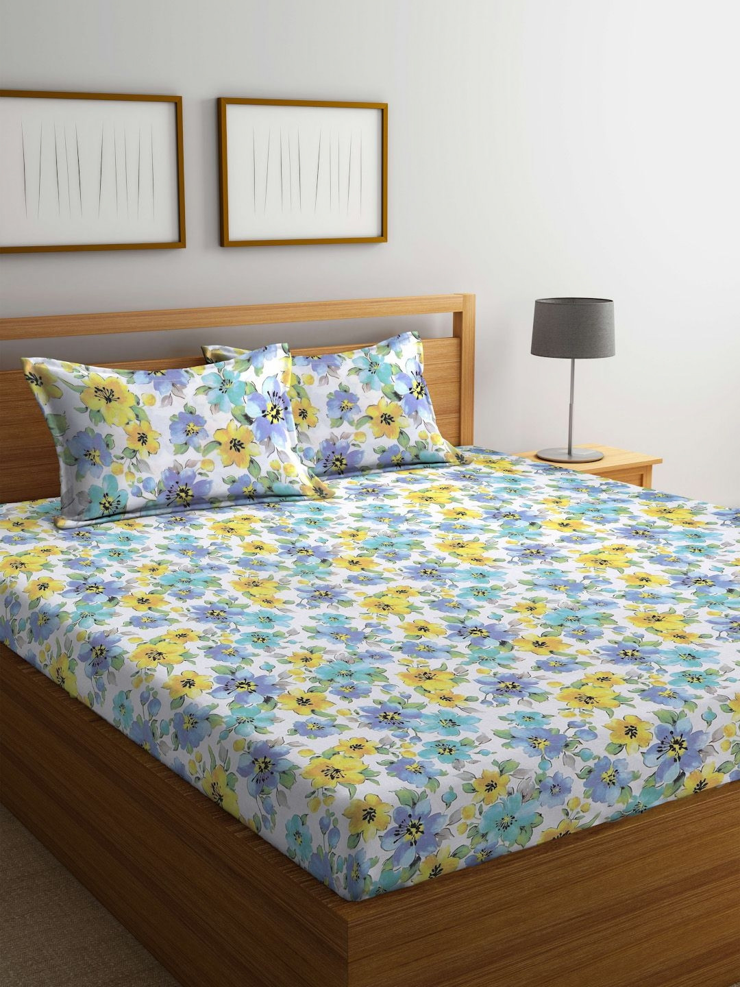 

BOMBAY DYEING Yellow & White Floral Cotton 144 TC Queen Bedsheet with 2 Pillow Covers
