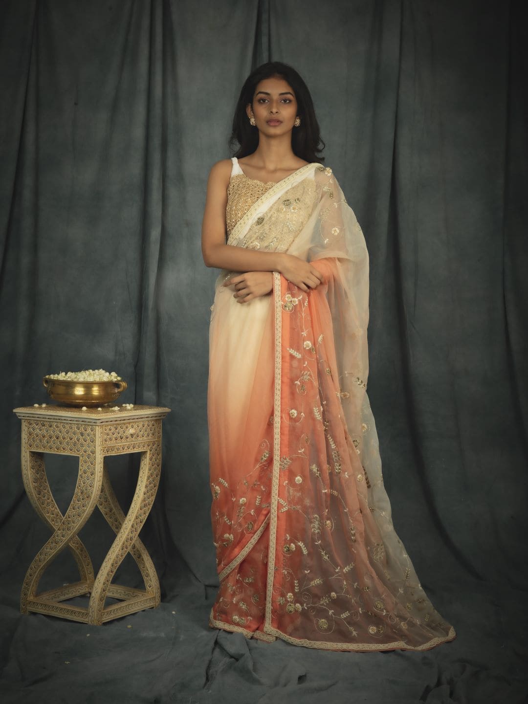 

Nikita Vishakha Ethnic Motifs Embroidered Organza Saree Pack of 3, Peach